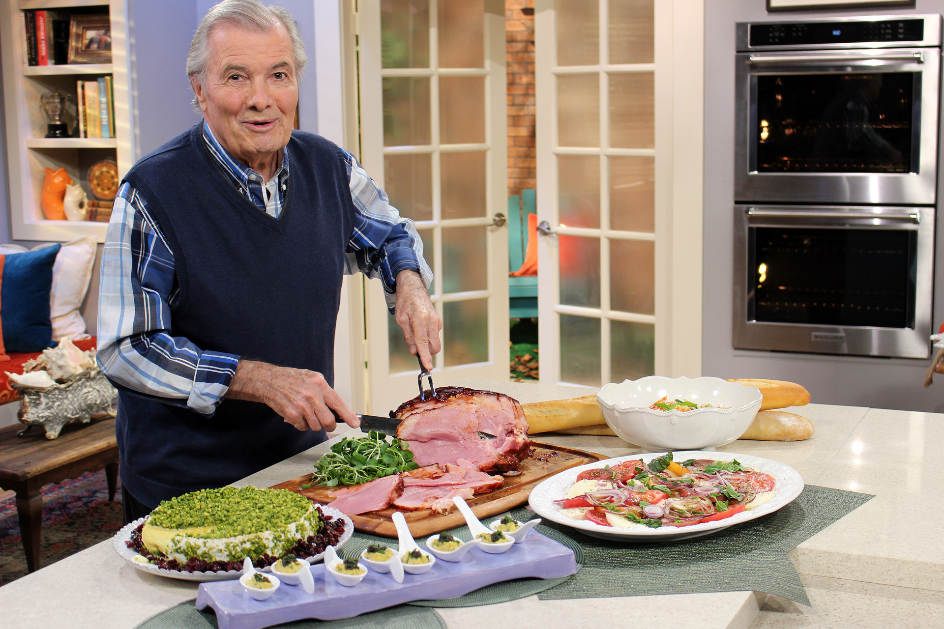 Jacques slicing the Smoked Ham Glazed with Maple Syrup on the set of Heart & Soul.