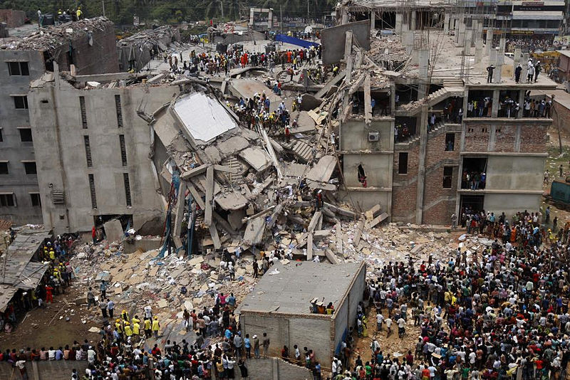 The collapsed Rana Plaza in Bangladesh, where more than 1,100 garment workers were killed in 2013. (Wikipedia)