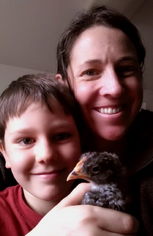 Ellen Jenkins, 8-year-old Nyles and their chick.