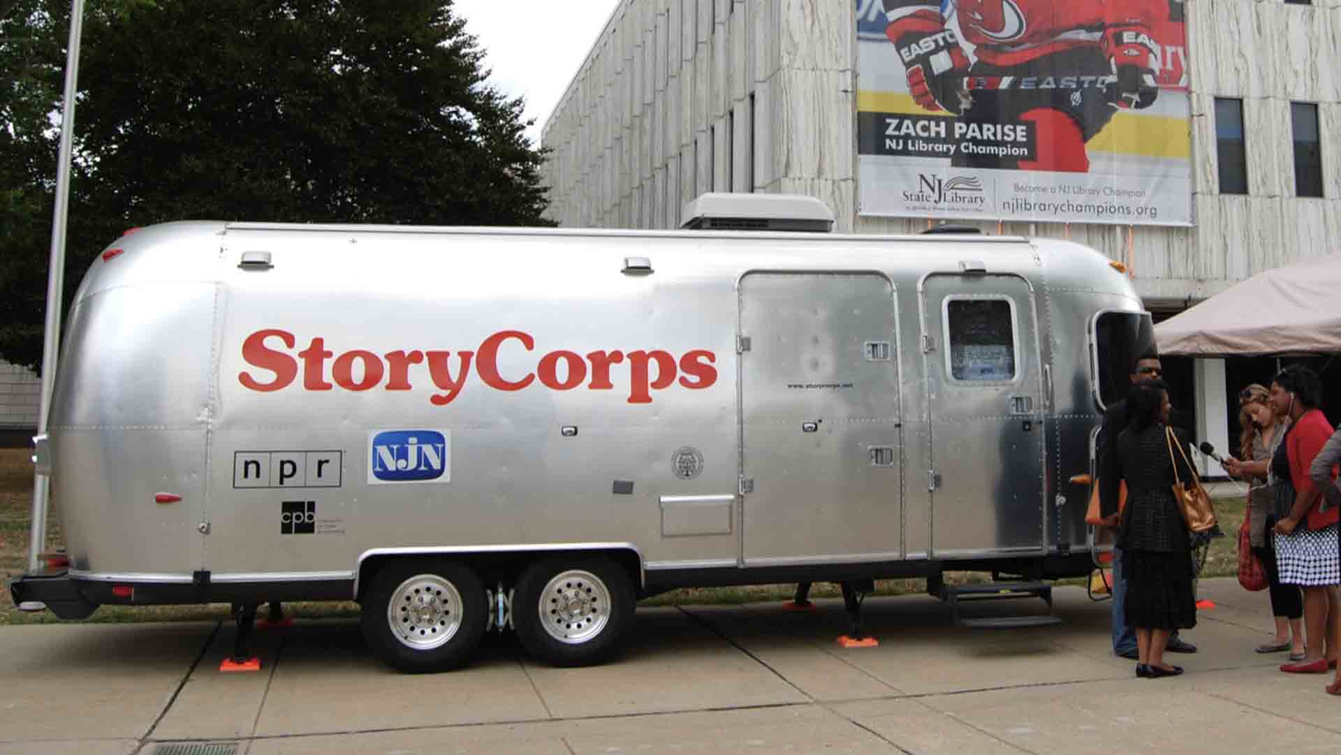 A StoryCorps mobile recording booth in front of the New Jersey State Library. 