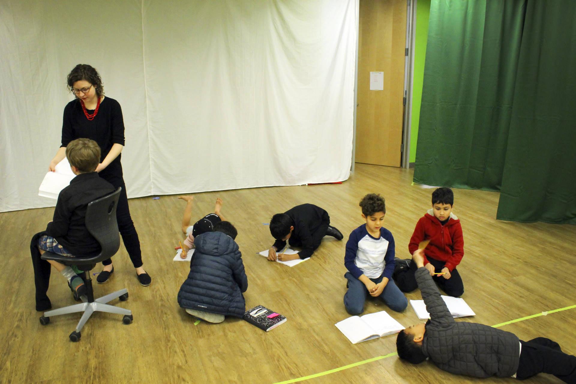 Students rehearse a play at the Khan lab school.