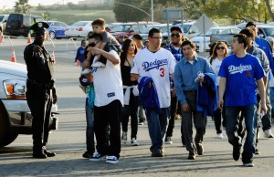 LAPD watch as Dodger fans enter Dodger stadium.