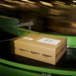 An Amazon parcel passes along a conveyor belt. (Bruno Vincent/Getty Images)