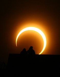 A Chinese couple watches an annular solar eclipse over Zhengzhou. (STR/AFP/Getty Images)