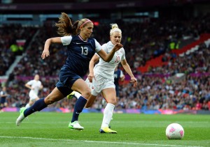 US forward Alex Morgan (L) and Canada's defender Lauren Sesselman compete during the London 2012 Olympic women's football semifinal match between the US Canada at Old Trafford in Manchester, north-west England, on August 6, 2012. (Paul Ellis/AFP/Getty Images)