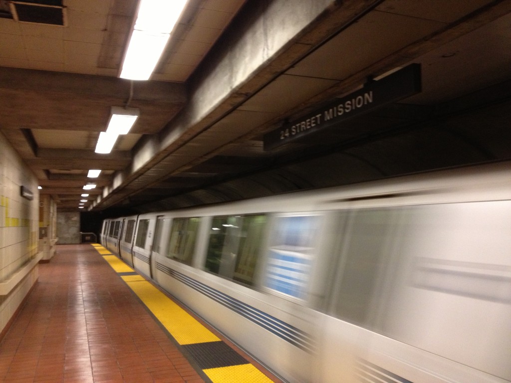 An eastbound BART train departs San Francisco's 24th Street/Mission station. 