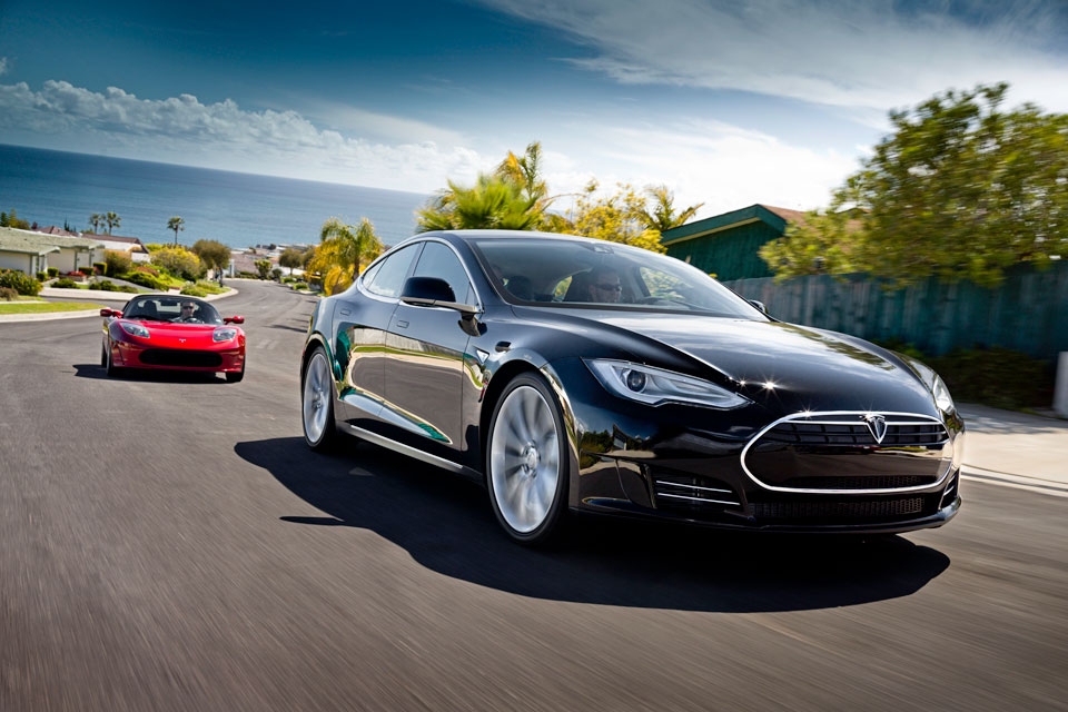 Tesla Motors' Model S (right) is the second model it has released. The Roadster (left) was its first. (Tesla Motors)