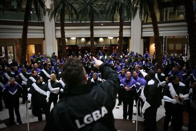 Members of the Lesbian and Gay Band Association prepare for the Inaugural Parade. (James Tensuan/NewsHour)