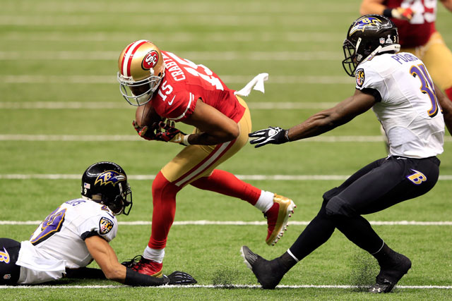 Michael Crabtree broke several tackles on his way to a 31-yard touchdown - photo by Jamie Squire/Getty Images.
