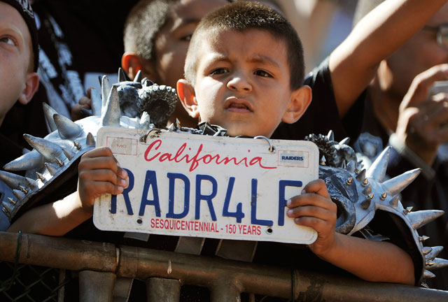 A young Raiders fan during a 2011 game in Oakland. (Thearon W. Henderson/Getty Images)