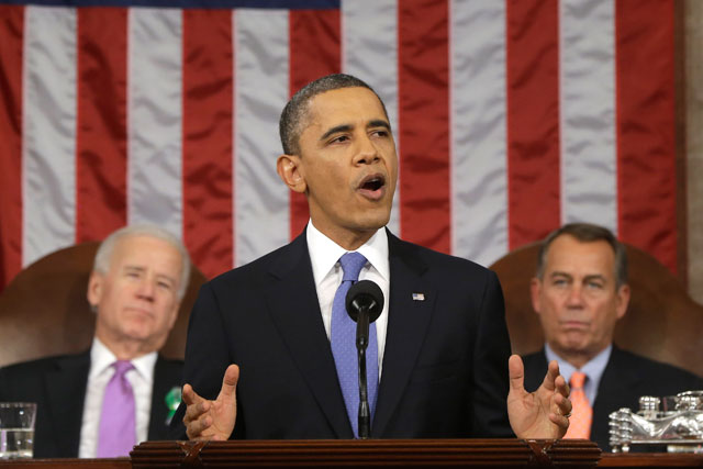 President Barack Obama, flanked by Vice President Joe Biden and House Speaker John Boehner, gives the State of the Union address. (Charles Dharapak-Pool/Getty Images