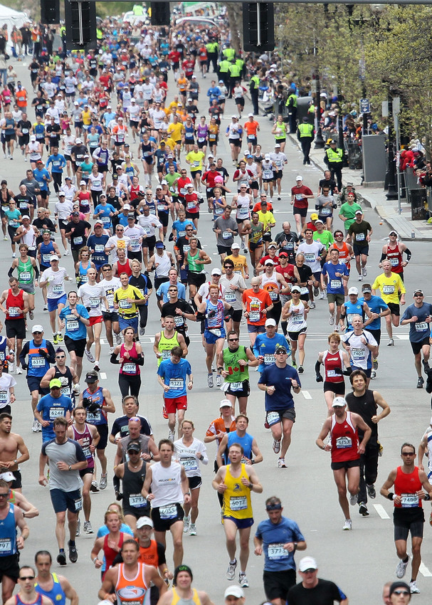  Participants run down Boylston Street toward the finish line during the 114th Boston Marathon on April 19, 2010 in Boston, Massachusetts. (Photo by Jim Rogash/Getty Images)
