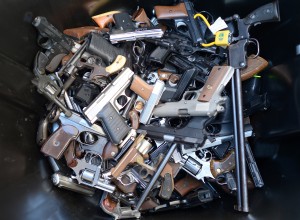  trash bin full of handguns collected during the LAPD Gun Buyback Program event in Van Nuys area, north of Los Angeles, on December 26, 2012. By noon LAPD collected more then 420 handguns, rifles and shotguns such as TEC-9, Assault rifle, Uzi, WWI rifle. Apart from it, there are 16 assault weapons and some vintage weapons. One is dated 1895. (Joe Klamar/AFP/Getty Images)