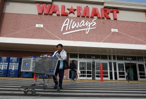 File photo. A customer leaves a Wal-Mart store in Oakland, California. (Justin Sullivan/Getty Images)
