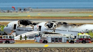 A Boeing 777 airplane lies burned on the runway after it crash landed at San Francisco International Airport July 6, 2013 in San Francisco, California. An Asiana Airlines passenger aircraft coming from Seoul, South Korea crashed while landing. There has been no official confirmation of casualties. (Photo by Ezra Shaw/Getty Images)