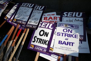 Picket signs sit in a stack outside of BART's Lake Merritt station on the first day of last month's strike. (Justin Sullivan/Getty Images)