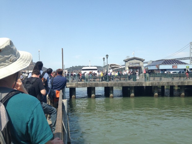 People wait in a long line for ferry to Oakland. (Isabel Angell/KQED)