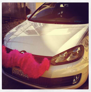 Rideshare companies like Lyft, which attaches pink mustaches to its drivers' cars, are subject to new proposed regulations by the state PUC. (Photo courtesy of Lyft).