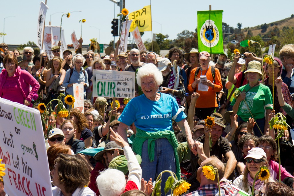 Ellen Small, 90, a retired nurse from Oakland, gets ready to be arrested during Aug. 3, 2013, protest at Chevron's refinery complex in Richmond. She was one of 210 people arrested. (John Orvis/johnorvis.com)