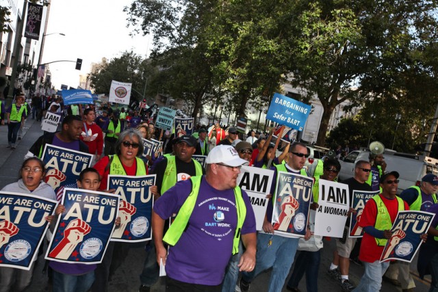 About 400 BART workers and union supporters gathered in Oakland at Frank Ogawa Plaza in August 2013 to rally in support of better wages for BART workers. (Deborah Svoboda/KQED)