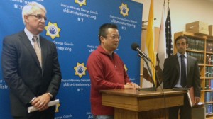 Victim's son, Terry Hui, with San Francisco District Attorney George Gascon and Deputy DA Omid Talai. (Bryan Goebel/KQED)