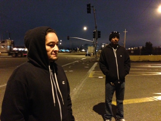 Herbert Olivares (left) and Mohammed Sam are among a group of independent truckers who tried to shut down the Port Of Oaklandon Monday  over low pay and long waits. (Cy Musiker/KQED News). 