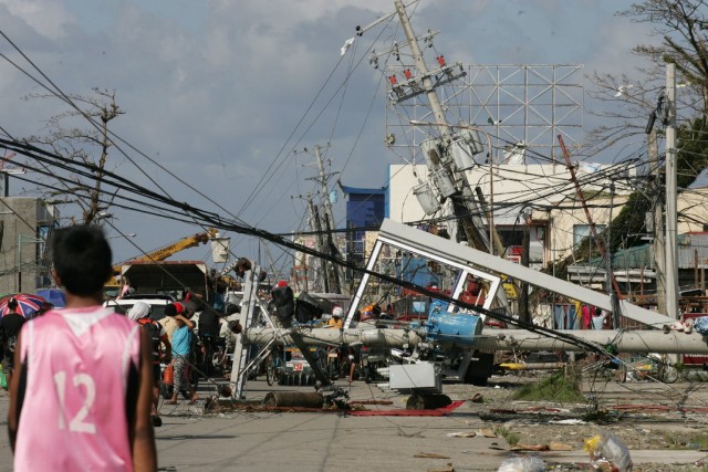 Typhoon Haiyan wrecked Tacloban, a city of about 200,000 people on the Philippines island of Leyte. (Photo by Jeoffrey Maitem/Getty Images)
