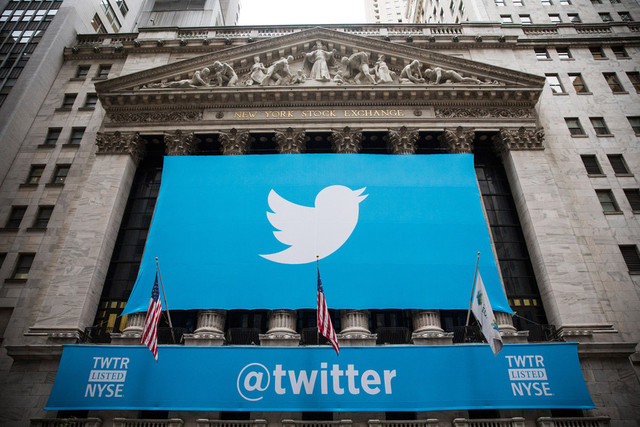  The Twitter logo is displayed on a banner outside the New York Stock Exchange. (Photo by Andrew Burton/Getty Images)