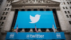 A Twitter banner hung outside the New York Stock Exchange when Twitter debuted its stock on November 7. (Andrew Burton/Getty Images)