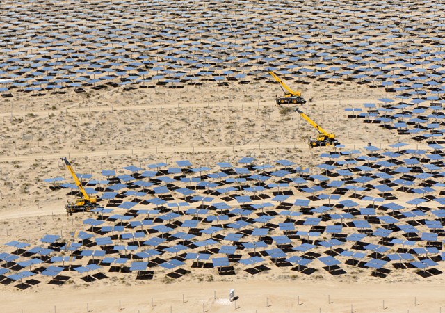 Early this summer, construction continued on the Ivanpah Solar Electric Generating System in the Mojave Desert. Ivanpah, the largest solar thermal power plant in the world, opened this year, putting the state a step closer to its ambitious renewable energy goal. (Lauren Sommer/KQED)