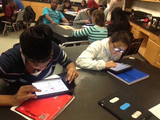 Students at Martin Luther King Jr. Middle School in San Francisco complete a science assignment using iPads. (Ana Tintocalis/KQED)