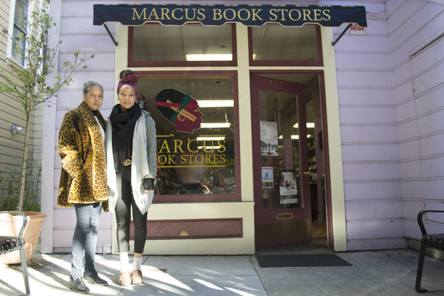 Marcus Books owner Karen Johnson and her daughter Tamiko Johnson in front of their store. (Sara Bloomberg/KQED)