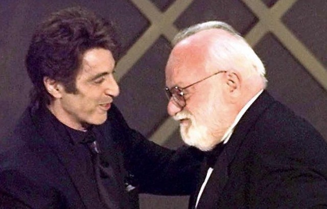 Actor Al Pacino, left, congratulates film producer Saul Zaentz during 1997 Oscar ceremony in Los Angeles after Zaentz's film "The English Patient" was named Best Picture. (Timothy A. Clary/AFP-Getty Images)
