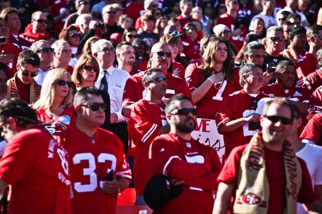 San Francisco 49ers fans celebrate at Candlestick Park during the regular season. (Deborah Svoboda/KQED)
