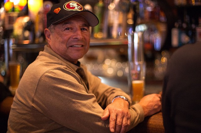Art Olivares was sitting at a barstool at Lefty O'Douls when we approached him. His first memory of the 49ers was a dark one: a 49ers' playoff loss to the Dallas Cowboys (they knocked the Niners out of the postseason in 1970. '71 and '72). But he expects this season to end differently. "The expectations are the same: They won last year, and they're going to win this year." (Mark Andrew Boyer/KQED)