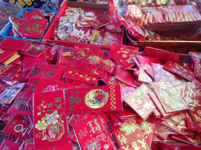 The color red, which symbolizes good fortune and happiness, is ubiquitous during the 15-day Lunar New Year celebration. (Patricia Yollin/KQED)