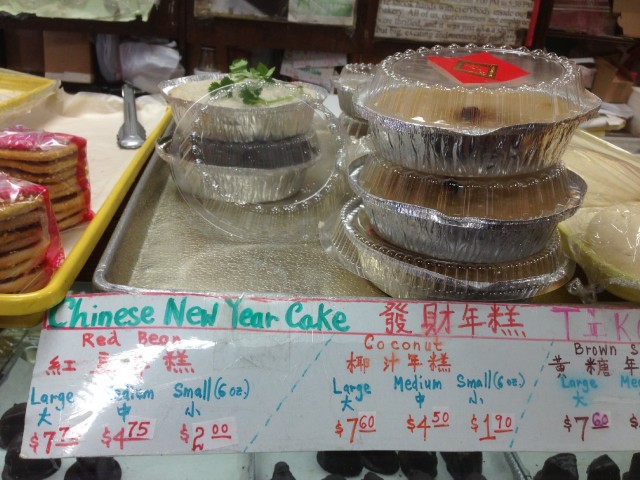 The window of the Eastern Bakery on Grant Avenue in San Francisco's Chinatown featured a Chinese New Year cake. (Patricia Yollin/KQED)