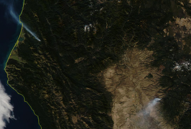 A NASA satellite image shows fires burning over the weekend in Humboldt County (left) and Tehama County (right). (NASA/University of Wisconsin)