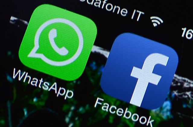 The Facebook and WhatsApp applications' icons are displayed on a smartphone on February 20, 2014. (Gabriel Bouys/AFP/Getty Images)
