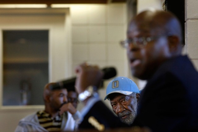 John Oliver, 76, a 10-year Nevin Plaza resident, listens as Richmond Housing Authority Executive Director Tim Jones explains issues at a Housing Advisory Commission meeting Oct. 22, 2013. Residents say their pleas for basic maintenance often are ignored by officials paid to provide services to the poor. (Lacy Atkins/San Francisco Chronicle)