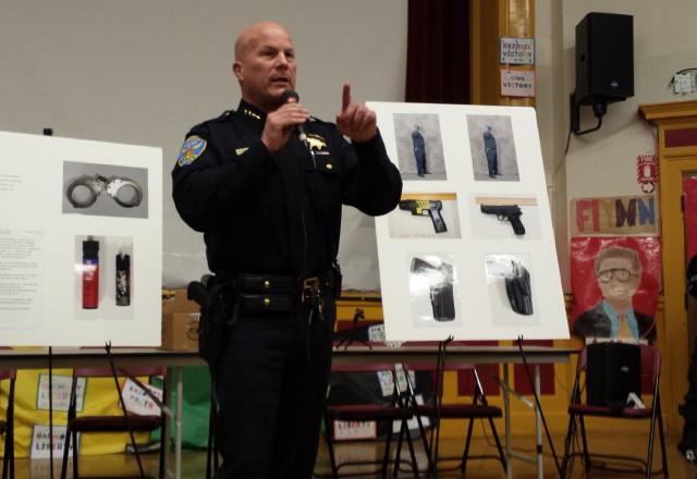 San Francisco Police Department Chief Greg Suhr addresses an angry crowd at a town hall meeting Tuesday about a recent fatal officer-involved shooting in the city's Bernal Heights Park. Suhr said officers believed 28-year-old Alejandro Nieto pointed a gun at officers from 75 feet away, but the weapon turned out to be a Taser stun gun.