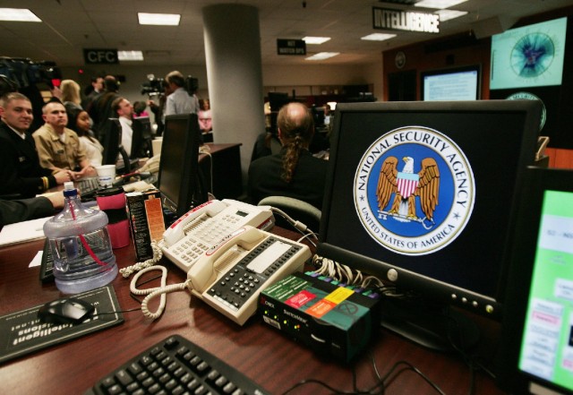 A computer workstation bears the NSA logo inside the Threat Operations Center in Fort Meade, Md. in this 2006 photo. (Paul J. Richards/AFP/Getty Images)
