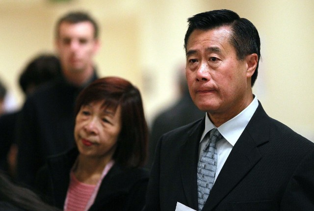 California state Sen. Leland Yee and his wife, Maxine Yee, wait to cast their ballots in San Francisco in November 2011. (Justin Sullivan/Getty Images)