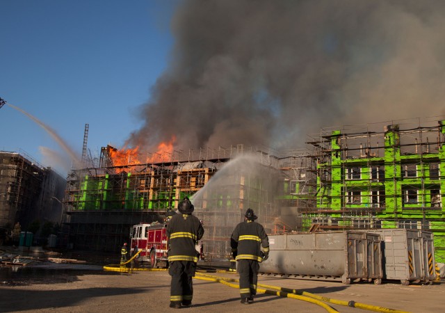 San Francisco firefighters respond to the fire at Fourth and China Basin streets on March 11. (KQED)