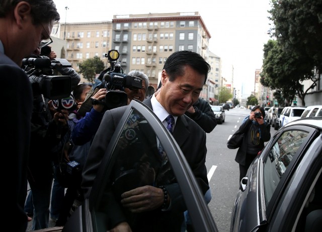 State Sen. Leland Yee gets into an awaiting car as he leaves the Phillip Burton Federal Building after a court appearance on March 31, 2014 (Justin Sullivan/Getty Images).