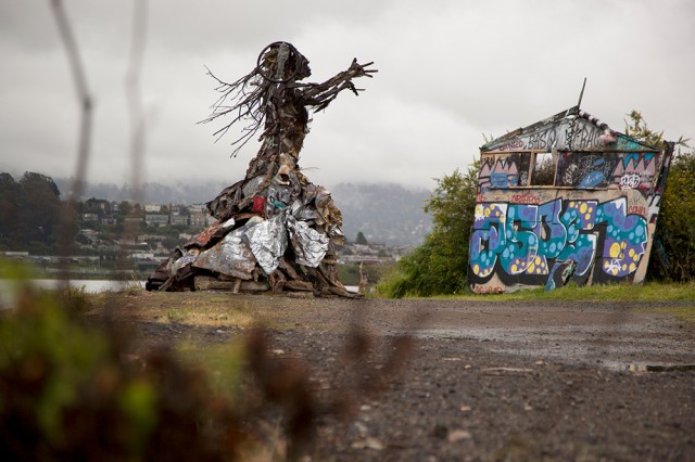 Sculptures created by artist and lawyer Osha Neumann stand on the shore of the Albany Bulb. (Mark Andrew Boyer/KQED)