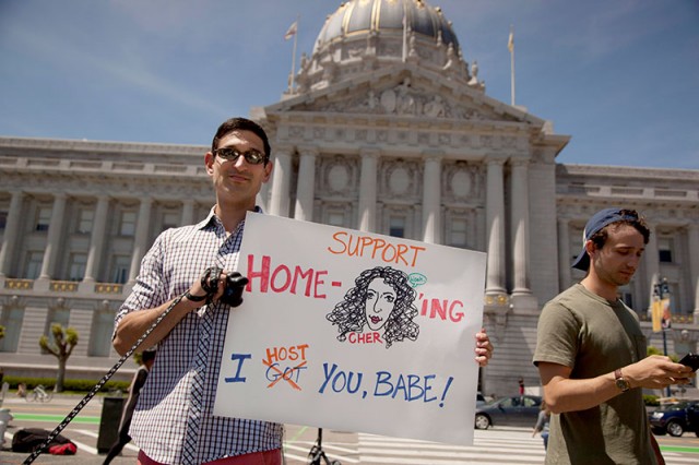 Frank Fahy shows his support for Cher and home-sharing (Mark Andrew Boyer/KQED)