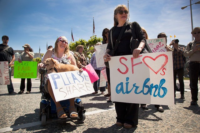 Victoria Schaller and Tish Kronen attended an Airbnb rally in front of San Francisco City Hall (Mark Andrew Boyer/KQED)