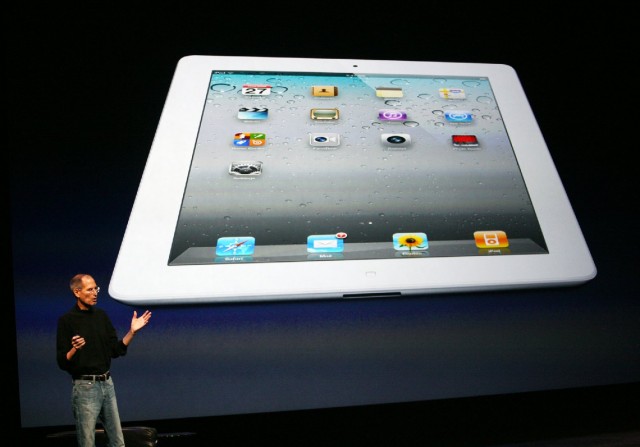 Steve Jobs introduces the second-generation iPad in March 2011 at the Moscone Center in San Francisco. (Kimihiro Hoshino/KQED)