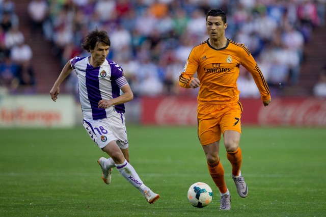 Cristiano Ronaldo, right, of Real Madrid CF competes for the ball with Alvaro Rubio of Real Valladolid CF during a match on May 7 in Valladolid, Spain. (Gonzalo Arroyo Moreno/Getty Images)